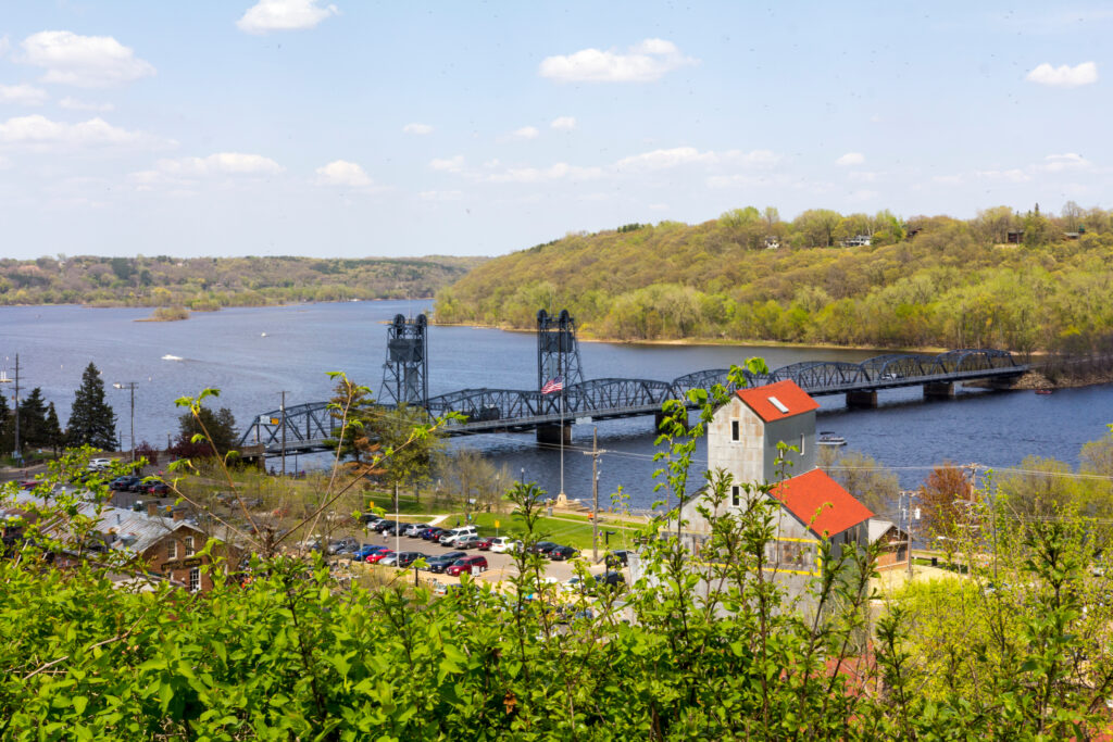 aerial view of the st croix river and historic stillwater lift bridge, one of the best things to do in Stillwater