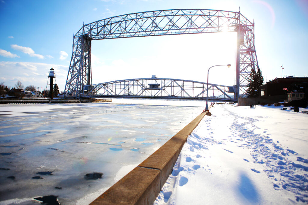 Walk in the snow along the St Croix River, one of the most romantic things to do in Stillwater MN