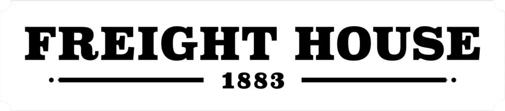 The text "FREIGHT HOUSE" appears in black, bold, serif font above the year "1883" centered between two horizontal lines.