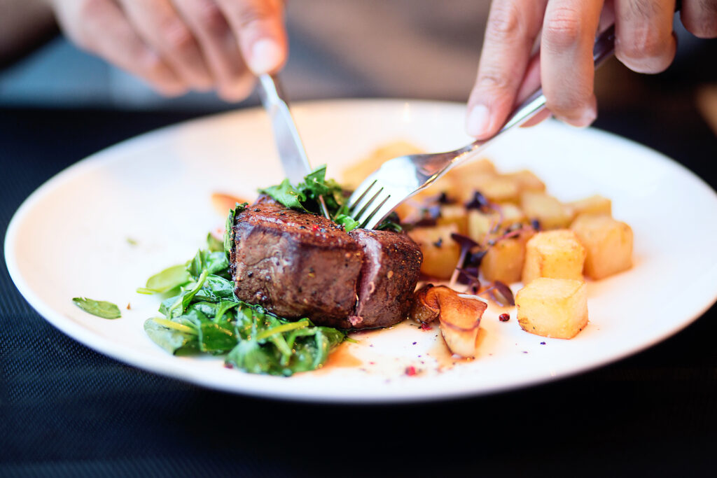 steak dinner on white plate at one of the restaurants in Stillwater